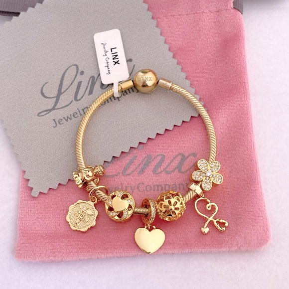 Linx Yellow Gold Snake Chain Bracelet with Registered Nurse Themed Charms - Picture 5 of 14